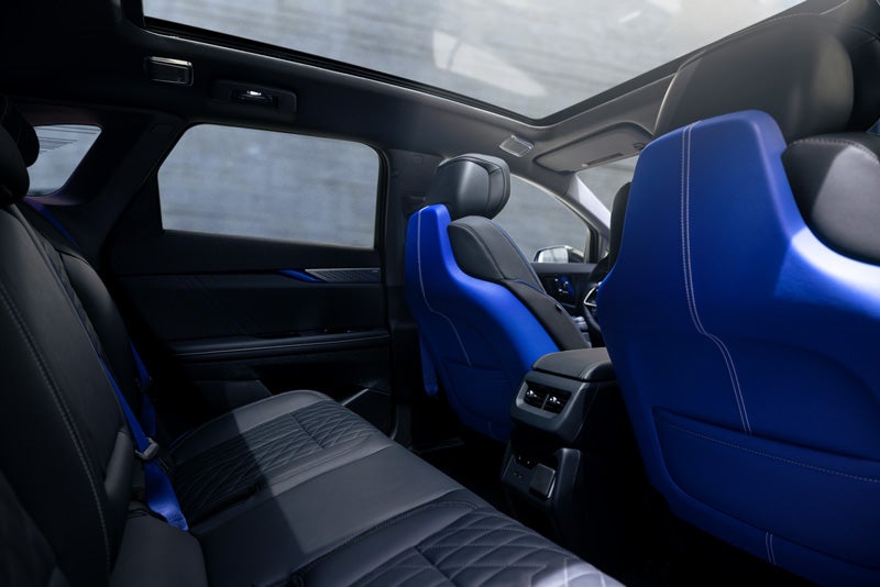 Back Seat View of the 2026 OPTIQ-V Blue Front Seats, Sun Roof, and Interior | Lindsay Cadillac of Alexandria in Alexandria VA